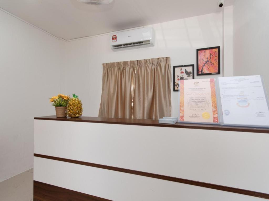 Oyo 44011 Weng Bee Guest House Кота Кинабалу Екстериор снимка